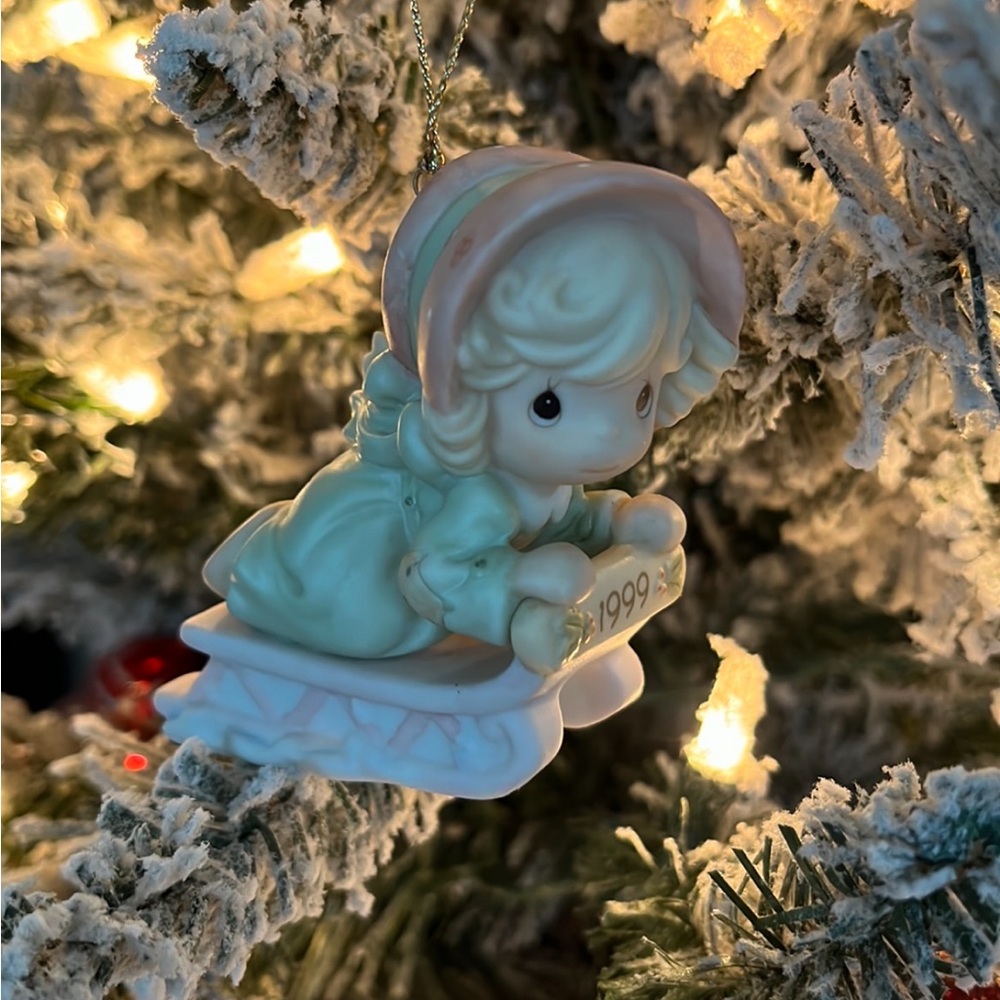 Precious Moments Ornament Girl Sledding Green and Pink Holiday 1999 #587788